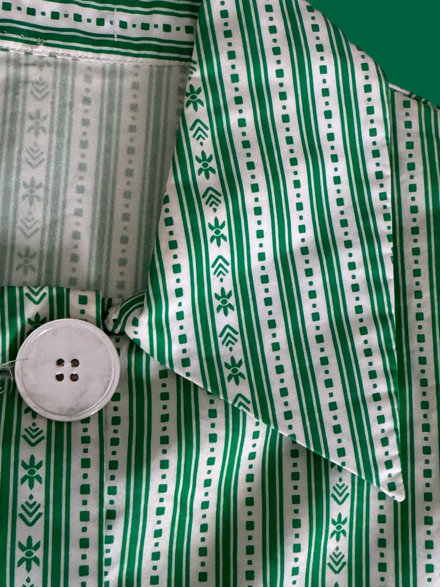 green & white striped shirt